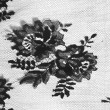 Tissu Dentelle de calais noir motif arabesque x10cm